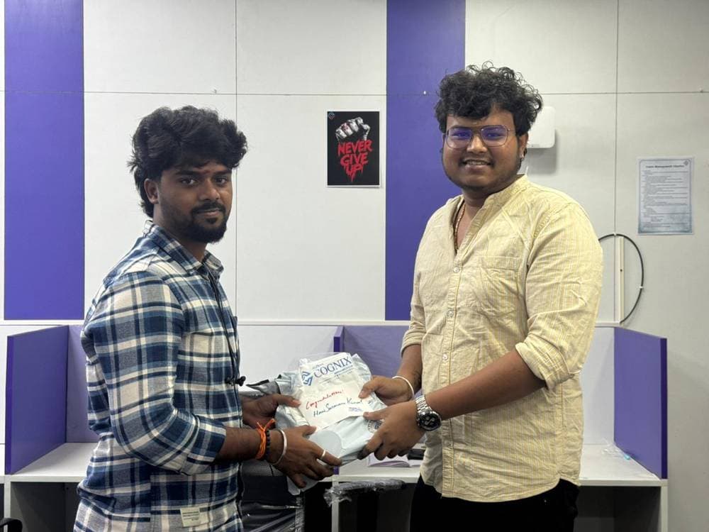 Founder handing over a kit to a learner
